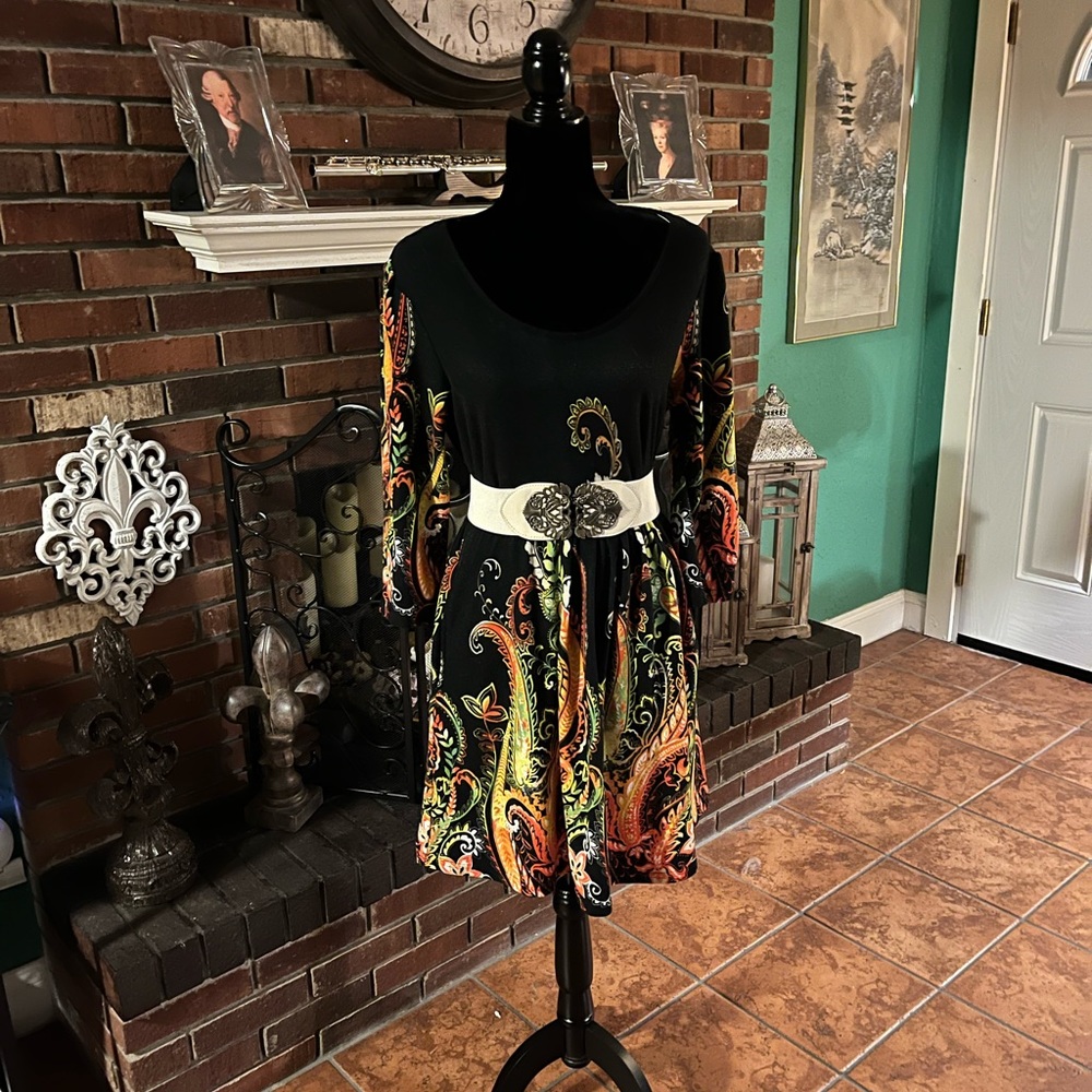 Mini dress with pockets, goes great with leggings.